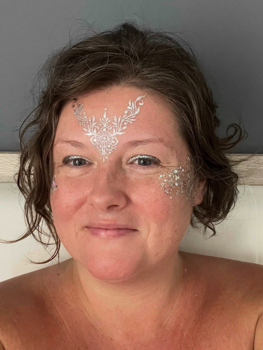 White lace and silver glitter festival makeup