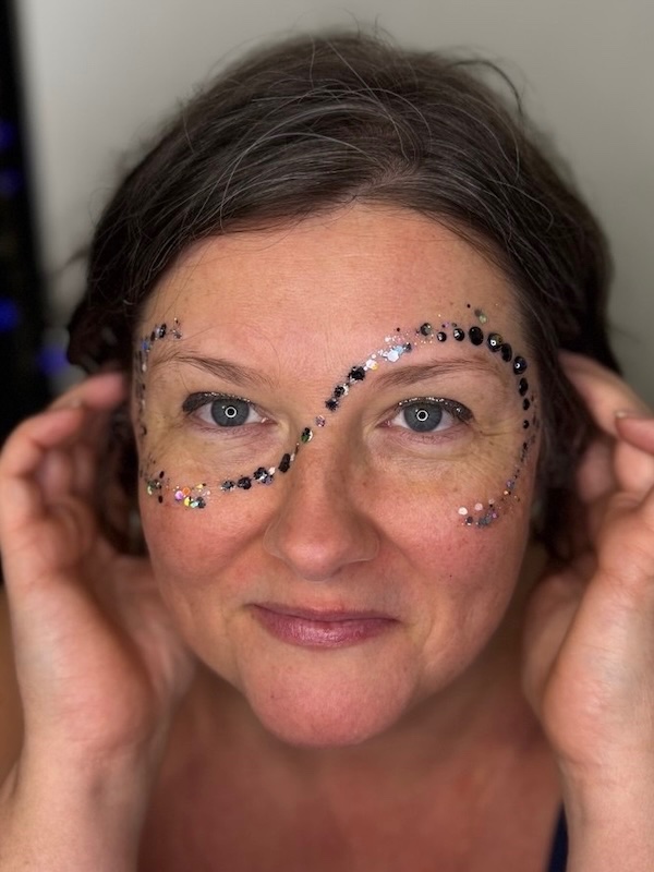 Black gem and glitter eye makeup design